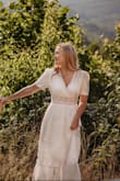 This was the perfect flowy dress for my engagement pictures! The details are so beautiful and I get compliments every time I wear it. It is a little tight around my ribs but that's just because of my body shape and I wouldn't change sizes. - Audra K.