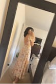 It fits perfectly and I love it. It feels expensive and it's pinker in person which is good because I'm wearing it to a wedding. All around 10/10. - Sarah R.
