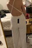 This was really cute and I thought about keeping it but ultimately returned it. The top was amazing and almost worth it but the back made my butt look flat. Just didn;t completely compliment my body shape. Fabric was nice and it seemed made well. Don't know if it woulda been good for more than one wear out but would have kept anyway if it fit me better. - Michelle T.