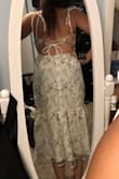 This dress is absolutely beautiful! It is perfect for my engagement photos. I am normally a size small or medium with clothes, but I decided to size up for a more comfortable fit with my stomach and I'm glad I did. I ordered a size Large. - Mariah G.