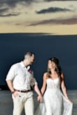 This dress was perfect for our tropical beach wedding! It is light, airy and flowy and fit like a glove. The train on the back is fun and perfect for pictures. Love it and woud definitely recommend. - Lauren B.