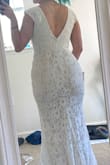 Well, I loved this dress right away. It fits well and probably will compliment any body type. It is super comfortable to wear, was one of the few I haven't felt like moving around and having to fix it up all the time. I would say go with your regular size if you have an average body, one of the issues with all the dresses I ordered was the zippers. They wouldn't work well, even if the dress was fitting properly the zipper would be stuck on the way up. The upper part of the dress is nice, if you purchase an adequate bra/shape wear it will look even nicer. My only complaint is the belly area, I wanted a snatched look but the belly had lots of extra fabric/stretch to it. I am usually a M on shirts but S in dresses . The overall fit was good enough. I will be using this dress for elopement pictures so it will do the job beautifully. Sorry about the mess in the pics. - Sarah F.