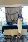 Loved this dress. Absolutely beautiful. When you sit the slit shows a lot of leg. - Ivana E.
