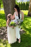Beautiful dress! I wore it for my wedding at the local courthouse. I'm a bit larger in the bottom area than most, so it was a little loose around the waist and top but with a nice push-up bra, it worked well. I did not have alterations done so whatcha see is what ya get! - Kelly L.