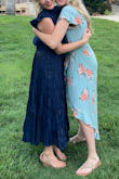 I was worried this dress was going to make me look homely but I took a chance and ordered it to wear to my brothers wedding. This dress will not disappoint. I received a ton of compliments and felt very pretty in this dress. I would recommend hair up with some hoops. Very chic. - Keshia O.