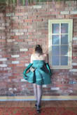 This dress was amazing to wear on my trip. As a petite person; it fit me perfect! The gloves and accessories went along nicely with it too. - Anna Y.