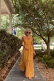Love this dress the fabric and color are really beautiful. It flows nice and can be made fancy or casual - Julie H.