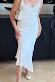 It's a beautiful dress with high-quality fabric. - Magalys M.
