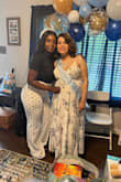 This dress was perfect for my babyshower. I was 31 weeks pregnant so I order one size bigger(M) since I got the dress a month 1/2 in advance. It was really comfortable around my belly area and I didn't need to use a bra which was perfect. I loved the flow of the skirt and it was just the right length so no alterations needed. Some people in other reviews complain about the heaviness of the skirt but it was not not an issue for me. I liked the extra fabric on the bottom because it made the dress not see-through and more flowy. - Arsenia P.