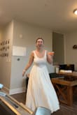 One of my all-time favorite dresses (this is saying a lot I have over 100 dresses). I seriously can't recommend [it] enough. Only downside is that the top is very see-through like I can't wear pasties b/c you can see them and I can't wear any bra b/c you can see very clearly everything underneath lol. Since the back is so low, I would make sure you have a bra you can wear with it before purchasing. - Katie K.