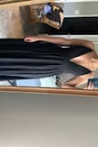 This is the perfect summer dress. It is lightweight and the straps on the back perfectly show off your summer glow! It is pretty low cut if you're comfortable with that. I used fabric tape to keep my chest in place for bending over/sitting, as the fabric will give some. - Whitney T.