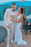I returned my dress from a well-known store to wear this dress on my wedding. It was absolutely stunning and exactly what I wanted. I added a belt from Amazon but it was just as pretty without it. I'm bigger in the bust area and it was very supportive and comfortable. - Bryanna R.