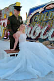 My husband and I renewed our vows at the Neon Museum in LV, NV and this dress could not have been more perfect! It fit like a glove without any need for additional tailoring (I'm wearing 6" platform heels). The length of the train was very long and romantic, and it looked very expensive. The lace and tulle were thick to the touch but delicate in appearance at the same time. Plus, the dress was very easy to iron after several long flights compressed in a suitcase. Highly, highly recommend it!!! - Caitlin M.
