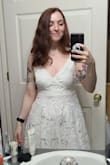4.5/5. Runs large, the small fit me perfectly but I'd typically be a size medium in other brands. I bought this dress for my commencement specifically because it has pockets and is not too short or too long. My only complaint is that the bust of my dress seemed off a hair- like the center or the plunge wasn't actually centered. That and the straps are quite thin. I preferred how my dress looked with the straps on a tighter setting, but they're so thin that they REALLY dig into your skin quickly. The dress is also rather heavy but it feels high-quality. Overall I'd recommend it. Just size down. :) - Tara T.