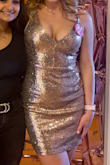 This dress is gorgeous. Hits a nice mid-thigh length, not too short! 
Fits really well the only issue was it was a little loose around the chest area. 
My measurements are correct for the review, I would've maybe needed some fashion tape to hold the back straps in place as they're a little long. Wore this for my birthday dress and felt like a star! Showing I've attached photos so you can kinda see what I mean about the gaping. - Monique R.