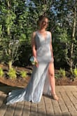 I got this dress for my prom and it fit PERFECT! I'm short and I did not even have to get it tailored. Just keep in mind the train is a little long but I was able to walk around and let it trail behind me. - Alexa M.