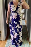 The flutter sleeves make this dress feel quite modest, but the open back means I can't wear a regular bra, which felt confusing. The print is striking, and the fit flatters my shape. Medium was the right size for me. But it was miles too long, and the bra thing helped me decide to send this back. I accidentally tucked the sleeves in once when trying it on, and I liked it better sleeveless. If I could sew, I would shorten it and remove the sleeves, and have a dress I really liked. - Ja R.