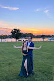 Got a lot of compliments, felt great wearing it, comfortable and classy. The green color is quite dark, though, and the length is enormous for someone my size = Runs large. - Mariana C.
