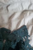 This dress came with many threads coming out top, bottom, sides.. and from the look of it this dress will keep falling apart with every occasion, every wash.. - Kasia K.
