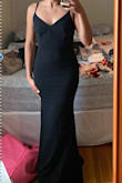 It's nicely fitted and the material is great. Wore it for a wedding. - Maria R.