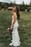 This dress was perfect for our intimate elopement wedding! It was very comfortable and light. 0% see-through and quality fabric it did not look cheap. After reading everyone's reviews I ordered an xs and it fit perfectly! I would normally never get an xs because of my hips but it hugged my curves and fit perfectly! - Janey T.