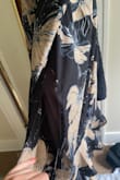 I've ordered many great, high-quality pieces from Lulus over the years. With that being said, there is a major quality issue with this dress, and I highly suggest you don't get it. I did not listen to the negative reviews about this dress and bought it anyway because I thought it was so beautiful. I ordered two sizes, small and medium, so that I could compare and make sure I was getting the correct size to avoid the dress ripping. The small fit perfectly, and hugged my figure comfortably, the way the dress seems like it was intended to fit. The medium was baggy around my chest, waist, stomach, and butt. I decided to wear the small to a wedding. Not even an hour into the wedding, I went into the bathroom, and it was completely ripped up the back. I had to wait until the lights were dimmed before I could stand up because it was pretty noticeable. Thankfully there was a slip under the dress or else I would have been flashing the entire wedding! Let this be your sign to NOT buy this dress!!! - Alexis D.