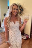 This dress is amazing. I received so many compliments on it. A perfect bridal shower dress! My only complaint was the nude liner sticks out a bit at the slit, but nothing a little double sided tape didn't fix! - Rachel S.