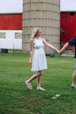 I bought this dress to wear for my engagement pictures. I really liked the comfort and quality of the fabric. It was thick enough to not be see-thru and had some stretch to it. - Dawn S.