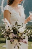 I have a pretty big bum and teeny, tiny boobs so was nervous about finding a dress for my big day, this dress was snug but in all the right places, I had to find a padded bra but overall I was super happy with the dress considering the value of it! - Emily W.