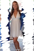 Wore this dress for my bridal shower. I'm short so "mini" dresses fit me well length-wise. However, the straps on this dress had to be shortened substantially by a seamstress. Then the waist of the dress hit higher than it was meant to. This created a nice look from the front, but not as flattering of a shape for me from the side. I still liked the dress, got lots of compliments on it, and will wear it again. I simply wouldn't recommend it to other short women who are looking for a good fit right out of the bag. - Kelsey M.