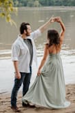 I wore this dress as a second option for our engagement photos. I think it's beautiful, [and] flattering and the color was perfect for our "earthy theme". The only thing that was a bit frustrating was no matter how much I loosened or tightened the straps, it was cutting into my neck. Can you tell? No, it was just something that I was aware of. Overall, beautiful. - Dana G.