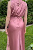 The dress looks exactly like it's advertised! I wore it to a wedding after I had steamed out the wrinkles from the shipment of course, and I got multiple compliments and people asking where I got it from. It was extremely flattering. I would recommend if you do have larger hips or are more on the curvy side that this dress may not be right for you as the area around the hips may be too snug and may distort the dress shape. I will definitely be coming back to this website in the future! I also paid extra for fast shipping and it came on time so I was so pleased! - Jessica B.