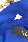 I love the fit and look of this dress but I am pretty disappointed in the quality. There are quite a few areas that the stitching in the dress is coming apart, the dress has not been worn yet so this shouldn't be an issue. - Melanie P.