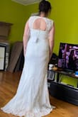 I got this dress today. I've been a little scared as I've never ordered from here and wasn't sure how quality would be, given the price. I am so pleased! The fabric doesn't feel super cheap like I expected and it fits beautifully. Needs to be hemmed because I'm short. But it's perfect. I can't wait to wear it for my wedding in Mexico! - Lyndsay D.