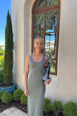 This dress is so comfortable! I love how the material breathes and fits my body. The slits are a great touch for functionality and adding to air flow. I loved it so much I ordered it in the green too! - Nicole E.