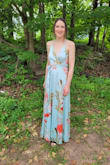 This dress is a dream! So much glamor...I bought this dress for a black tie wedding this summer. I had to send back the dress I first purchased due to size, but when I opened the package I was so pleased by the rich coloring and beautiful satin fabric! The satin, the beautiful floral print, the cut and style of the dress was simply elegant. The slit was revealing enough, while maintaining the elegance. I am quite small busted, so the adjustable straps were a must! Thank you for that! I also felt that they were thin enough for elegance without being so thin they are too delicate. The back required a small safety pin to conceal my strapless bra, but that worked perfectly. I am 5'8" and wore a higher wedge heel for comfort, the length was just perfect!
I purchased rhis dress in emerald and sage, for two weddings, both are incredibly beautiful. 
compliments all evening at the wedding! And when dancing all evening, the gown flowed beautifully and was very comfortable.
I loved everything about both dresses! - Sarah D.
