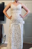 This dress is beautiful & beautifully made. It fit me absolutely perfectly. Snug, but not restricting. Intricate detail, especially the train! Unfortunately, I don't like the way it looks on my body, so I will be returning it! Also, the zipper clasp was broken when it arrived. - Abby J.