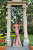 This dress is incredible. It's a heavier jacquard-like fabric. With a lining. A little tough to get over my hips (which are not big nor do I have a butt) but a little wiggle did the trick. I wore this to a black tie optional wedding and almost every female commented on how much they loved this dress. It was perfect! I wore a few-inch high heels so that made the length work. - Michelle D.
