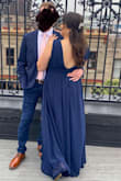 This dress is ABSOLUTELY GORGEOUS! It fits beautifully, it feels way more expensive than it really is. Wore it to a friend's wedding and got TONS of compliments! I had it hemmed and used the scraps to put a panel to make the neckline less plunging. I'm a 38D and felt that if I wore boob tape or something to lift them up a bit it would look gorgeous anyway, but I wanted some more coverage for modesty. I must say that even then I got compliments on the boobs as well hahaha I want to wear this dress in every color, every day! It's a must buy! - Luciana A.