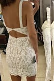 This dress is so pretty. I'm 5'4" and the straps were just a little bit long, though I don't think I'd need them altered. Otherwise fits perfectly and is really comfortable. I tried it on with a sticky bra since the back is open. Need to be careful when wearing this though because the detailing can get snagged easily. I love the fit and look of the dress but ended up going with a different style for the event I was attending. - Shannon W.