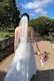 I found a wedding dress that suits me the most at a reasonable price and I absolutely love the details behind it! The skirt will float with the wind, very beautiful! - Lin C.