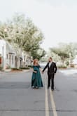 If you are using this for maternity photos, it is perfect, you do need to safety pin the top together because the button just falls open. I love that the straps were adjustable and that this was a true wrap dress. - Elizabeth