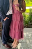 This dress fit like a glove. I have a very small chest but even still the design of the chest piece was so flattering. Dress works with and without the straps (tucked in). I got so many compliments on this outfit. Dancing and spinning is a must - Taziana M.
