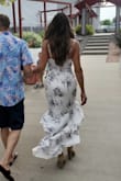 I originally ordered a medium based on reviews saying it runs small. It runs right on the money. I got a medium it was too big, I reordered a small and it fit perfectly. Look at my measurement they are accurate and go from there. This dress flows beautifully. I can see how bending over could split the seam, you need to move carefully in the dress, but it is worth it.  I am also small chested, I used double-sided fabric tape to adhere the top to my chest so it didn't over-expose. This was a new find for me, I loved it! I also used it on my wedding dress the next day. - Corrina K.