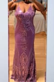 I ordered this dress as a contender for a dress to wear for my anniversary dinner and evening at the ballet. While I am choosing the other dress for that specific event, I can't wait to wear this when I get the chance. Even though I have a very large bust (34G), I ordered my regular size as suggested by Lulus and the adjustable straps meant that it worked very well. They kept everything in, along with my deep V, low back, and a strapless bra. The dress probably won't require the additional support of a bra with a smaller bust. The adjustable straps kept everything in place nicely and the bra and dress were super comfortable. Definitely buy this dress!
Iit's a gorgeous dress. - Tiffany H.