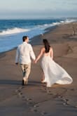 This dress is everything I had wanted and more! I wore it for my engagement pictures on the beach and it did not disappoint. I did have to get it altered slightly to adjust the strap length and it could have been hemmed to fit my height, but I was going for that flowing train look so I decided not to shorten it. The quality is amazing, the lace is thick and sturdy and after the straps were tightened I felt very supported in the bust. - Victoria B.