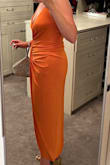 Love the material and fit. I think it hides some unflattering post-baby stomach. With some nipple covers and Spanx, I think we are good to go. Wedding guest attire on point! - Allison G.