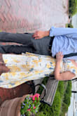 So I originally ordered this dress in the blue flowers because I loved the color, they only had a small so I wanted to try it even though I felt I'd need a medium. It came and while it overall fit and looked nice, it was just a tad too tight around the rib cage. I could have felt with it, but I was going to a wedding and wanted to be comfortable. So I ended up getting the yellow in medium and it was so beautiful! The medium for me was just right and was comfortable. - Sarah S.