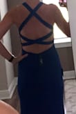 This dress is amazing! It's lined so I didn't even need to wear any shape wear which was a nice change from other dresses and a gorgeous color. This dress received compliments the entire night it was worn! The pictures do not do it justice - Alexandria P.