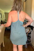 Cute dress. The material is a bit on the thin side, but not so much that panties show through. It is a tad more fitted on my hips (L- 41'), but it's still great for wearing at home & running errands on hot days. Great color. It's my go to to throw on every day. Wish there were more colors! Super casual easy-wear dress. - Casey M.
